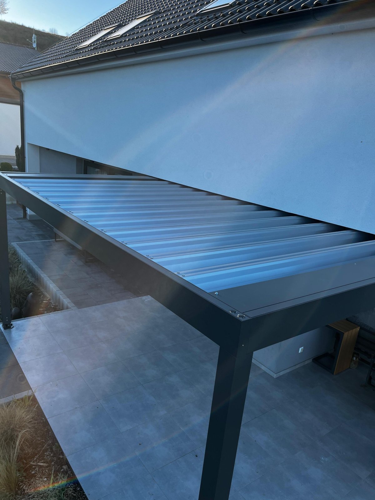 Pergola pozdĺž domu